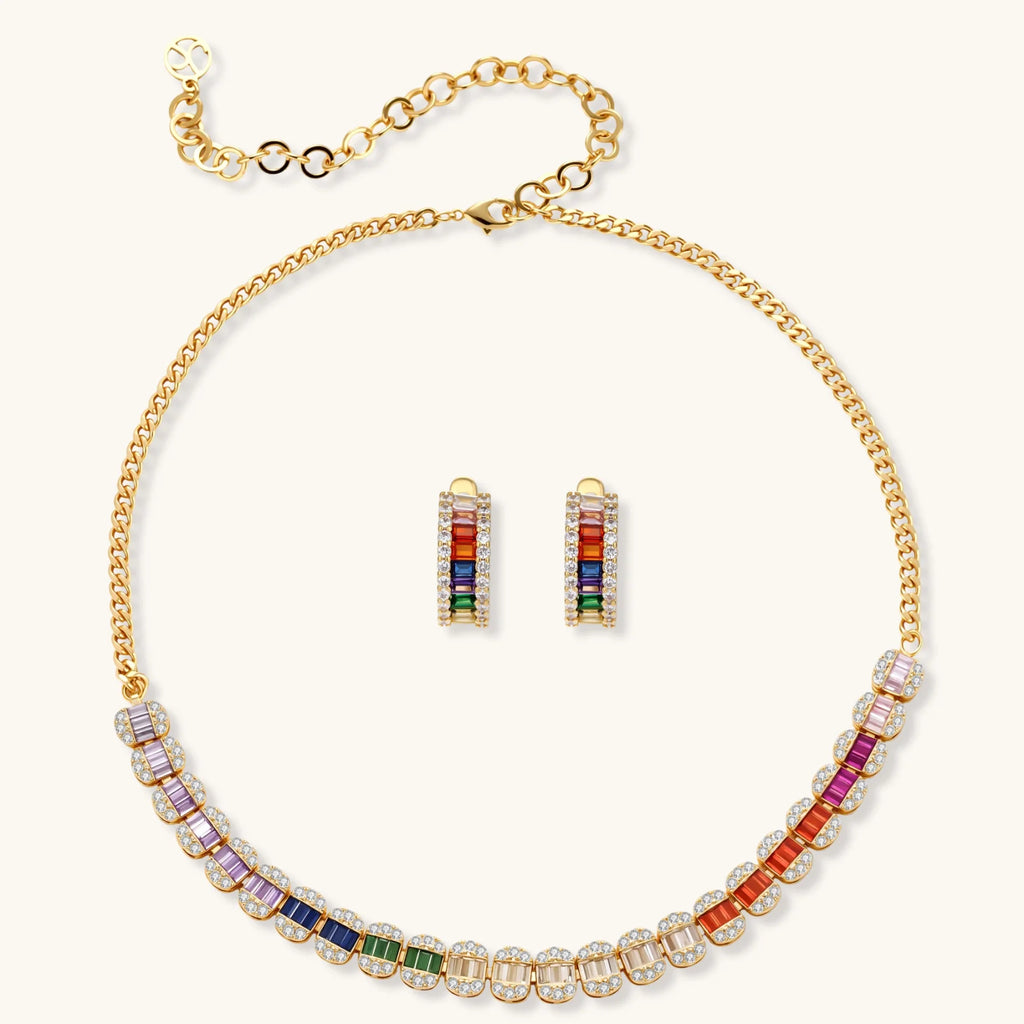 Jewelry set with gold necklace and earrings on a white background