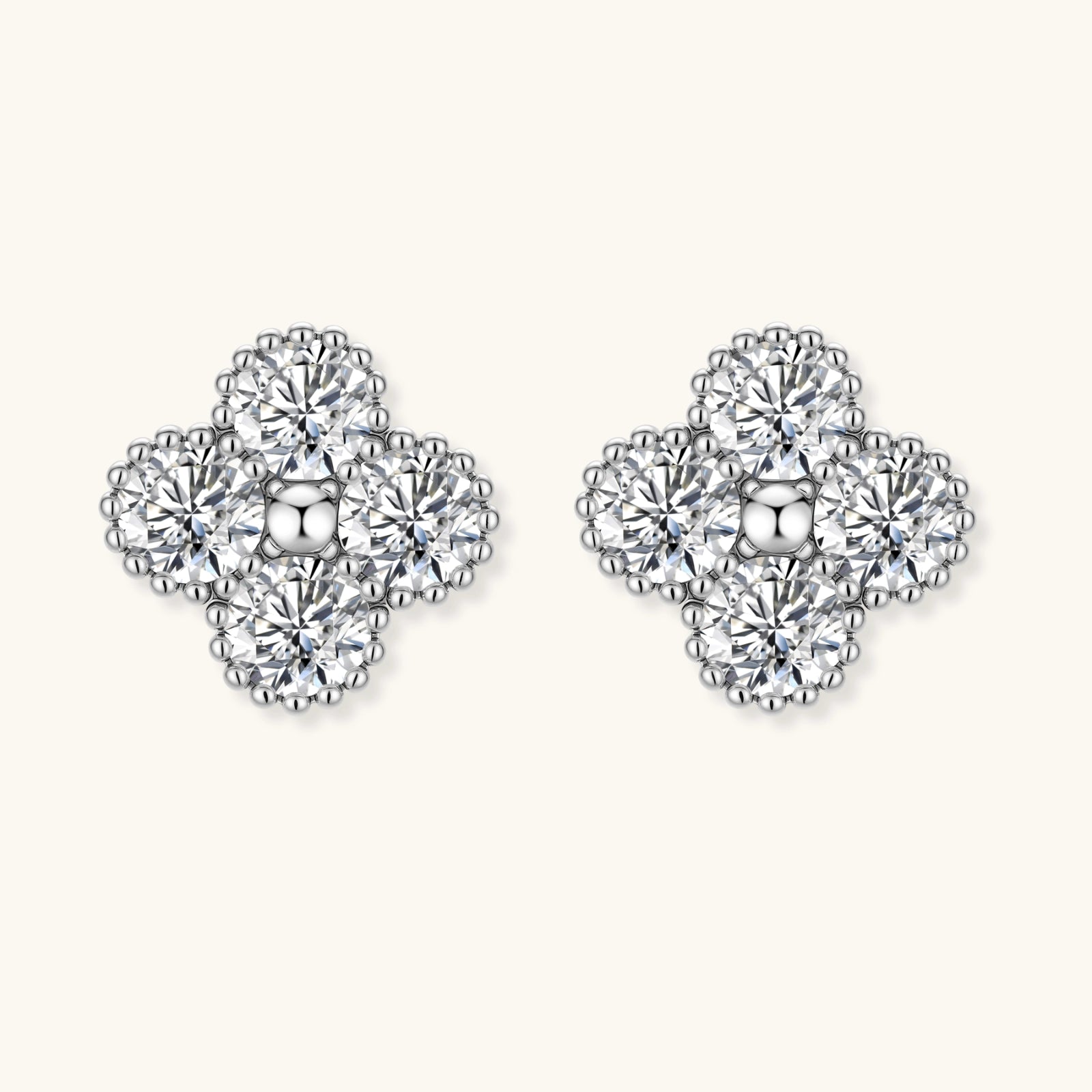 Pair of diamond earrings on a white background