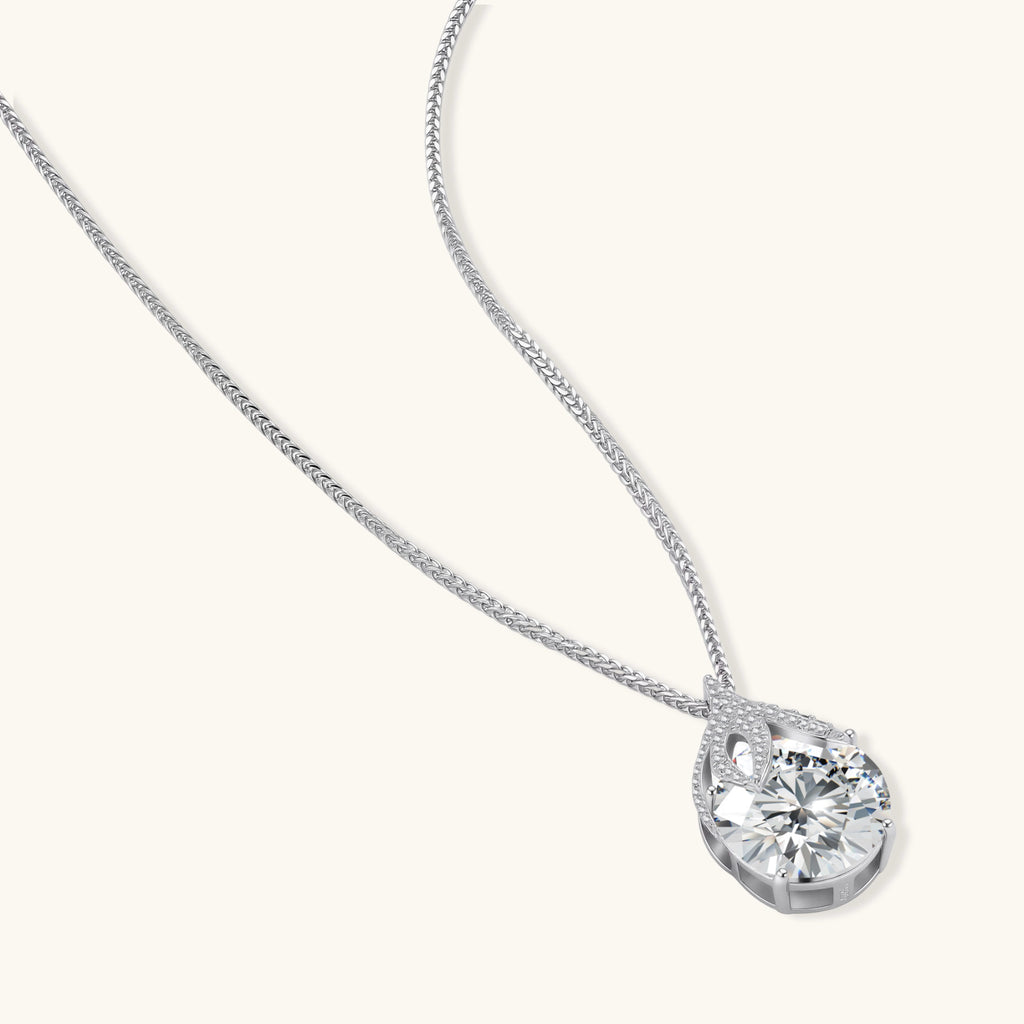Diamond necklace on a silver chain white background