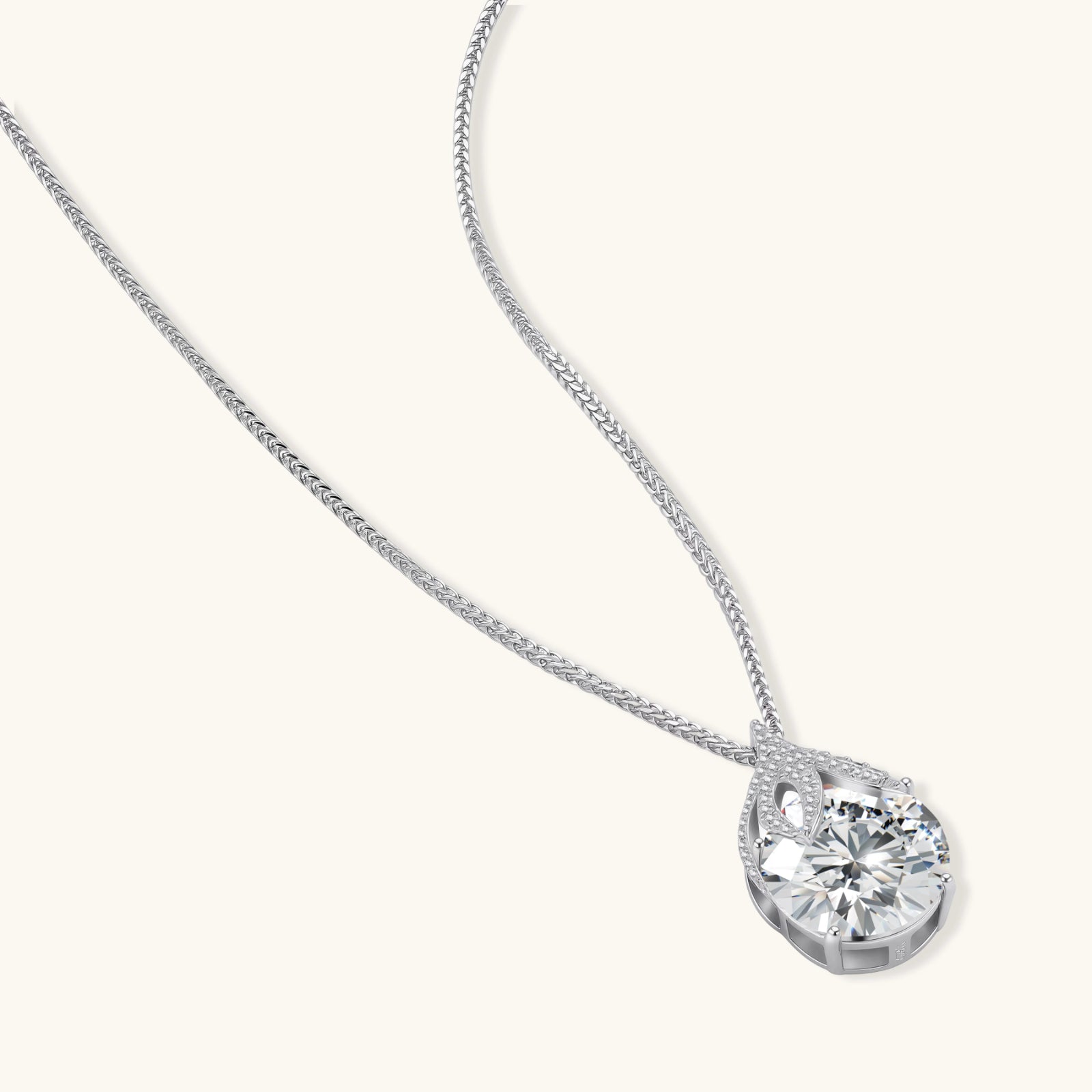 Diamond necklace on a silver chain white background