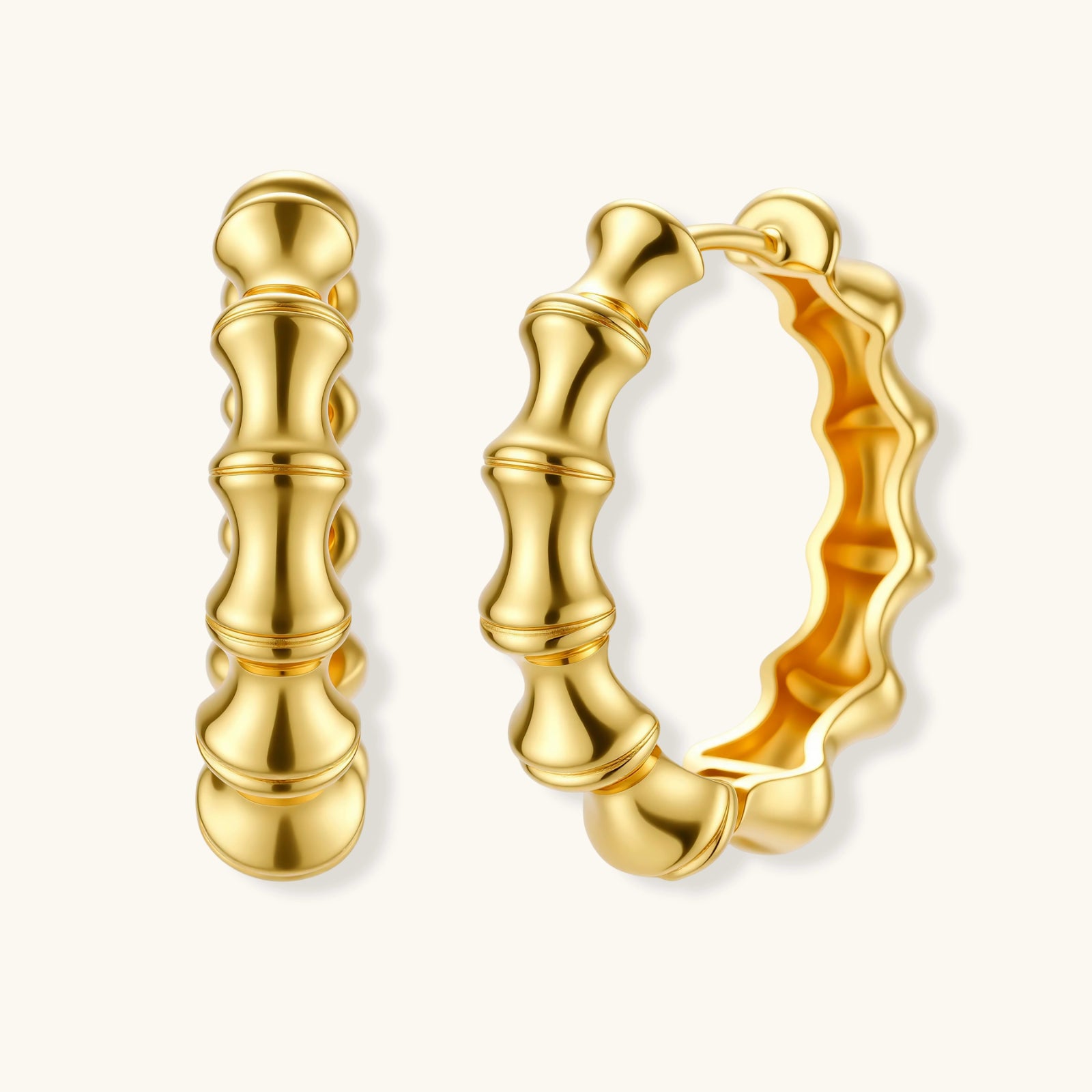 Gold hoop earrings on a white background