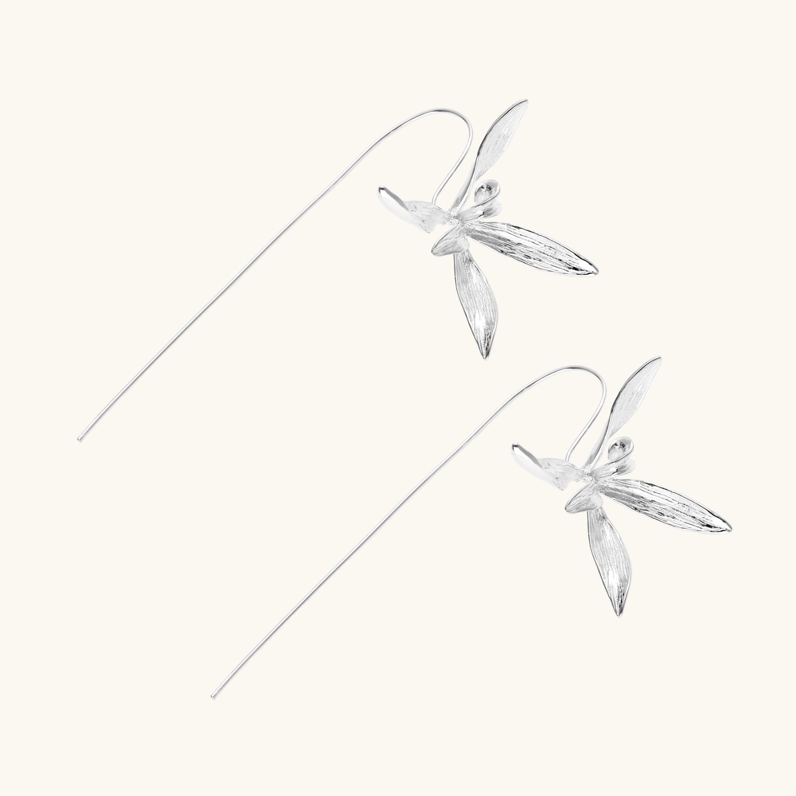 Sterling silver floral threader earring flat lay