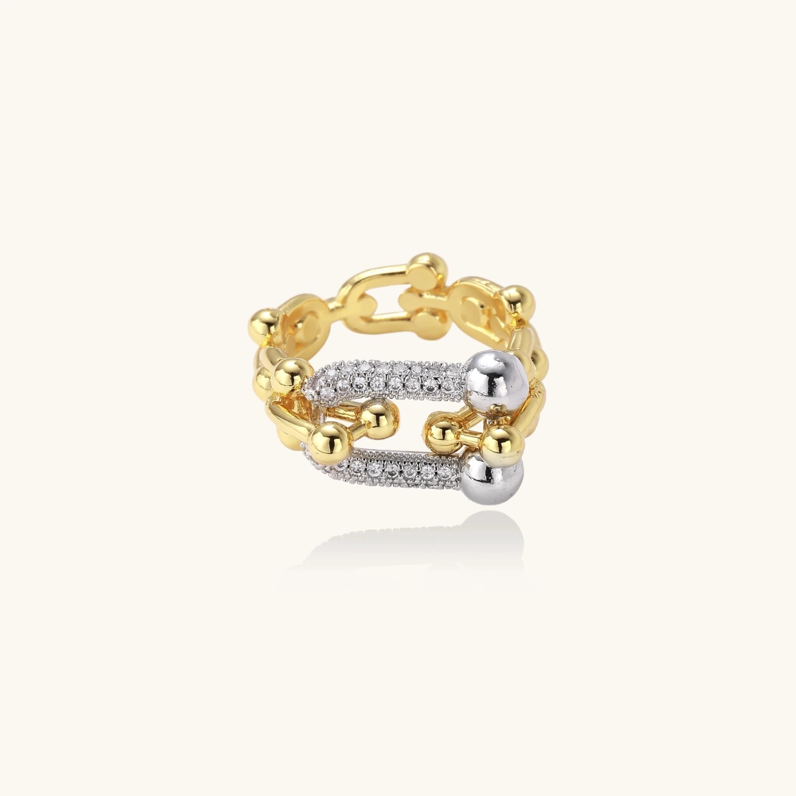Gold and silver ring on a white background