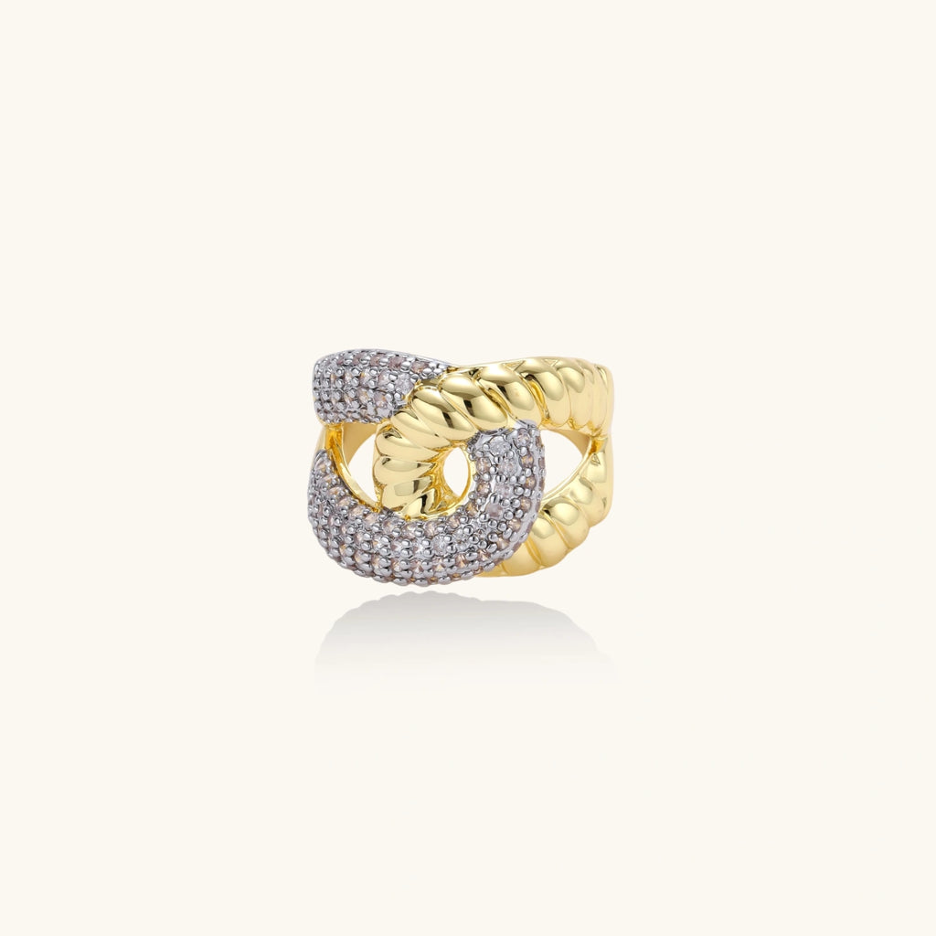 Gold and silver ring on a white background
