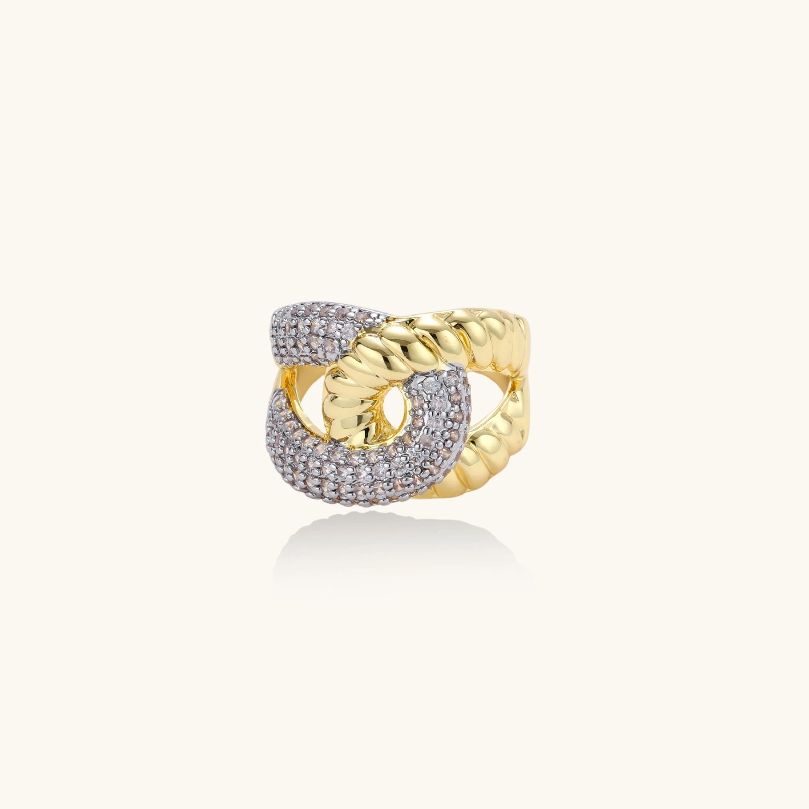 Gold and silver ring on a white background