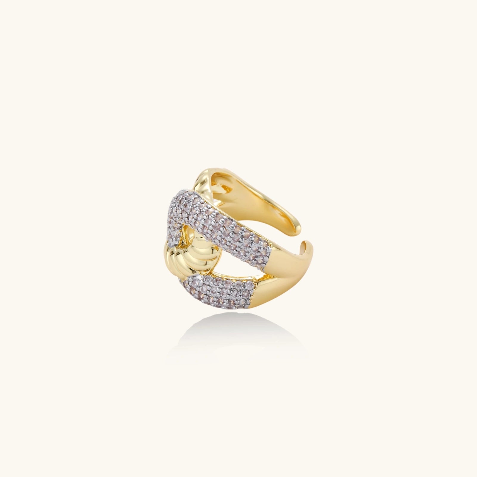 Gold and silver open ring on a white background